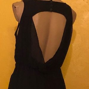 ON HOLD 
Pins and Needles open back draped black midi dress
